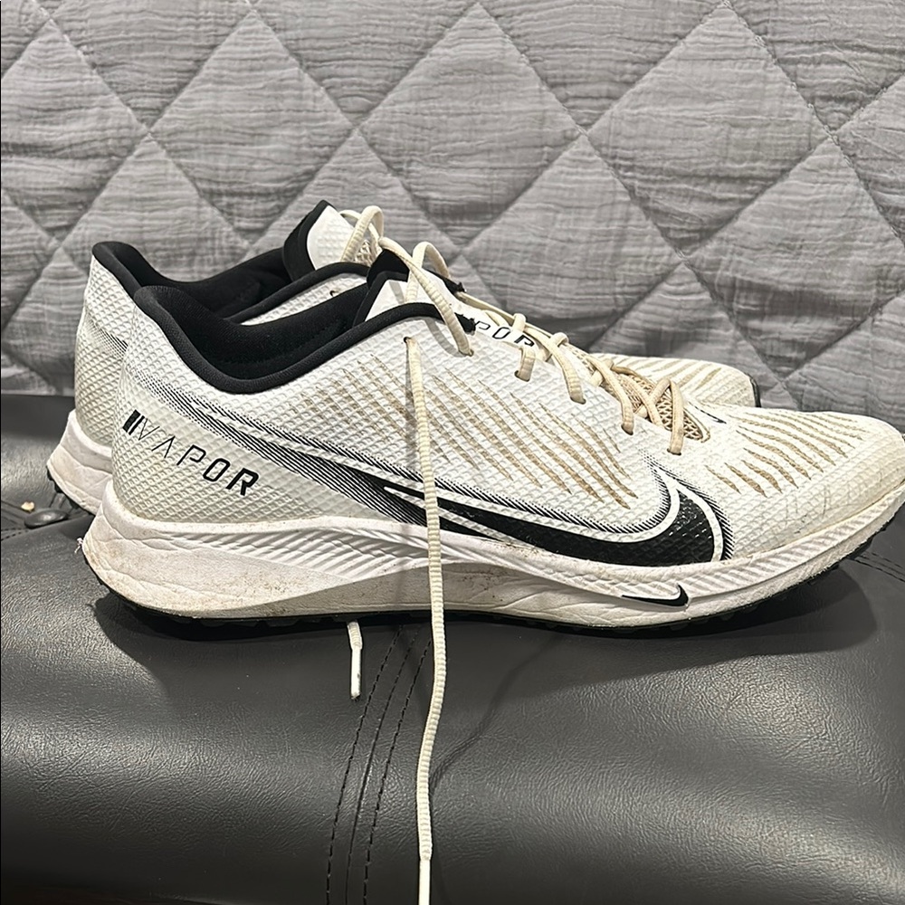 Nike White and Black Athletic Shoes with Modern Design